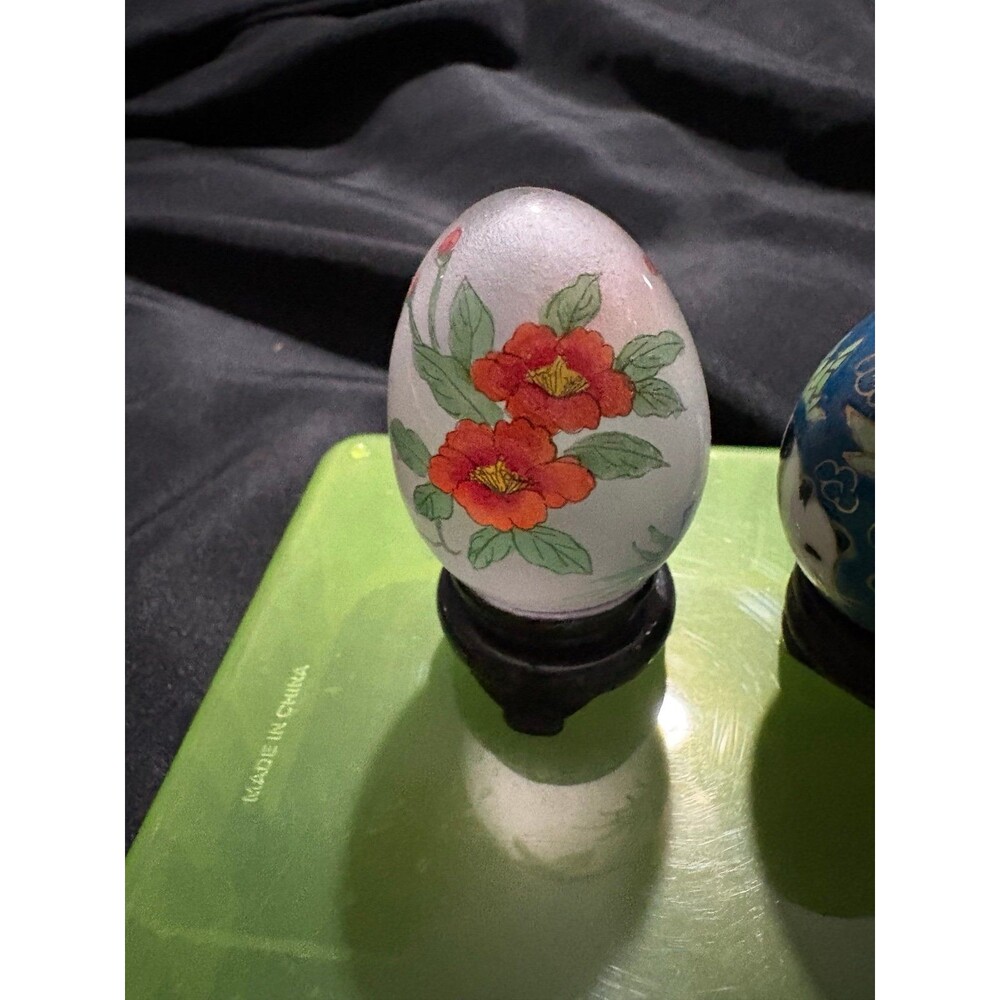 vintage Chinese reverse-painted glass egg featuring red peony flowers.